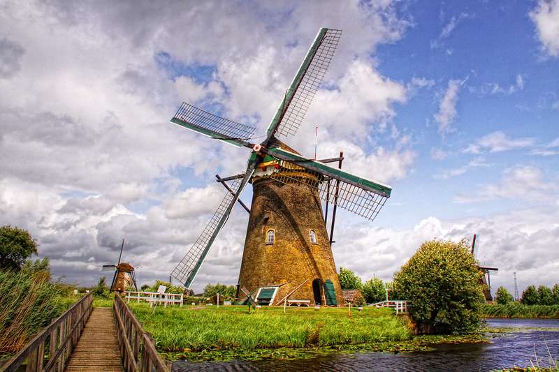Winter at Kinderdijk: Windmills and Snow-Covered Canals